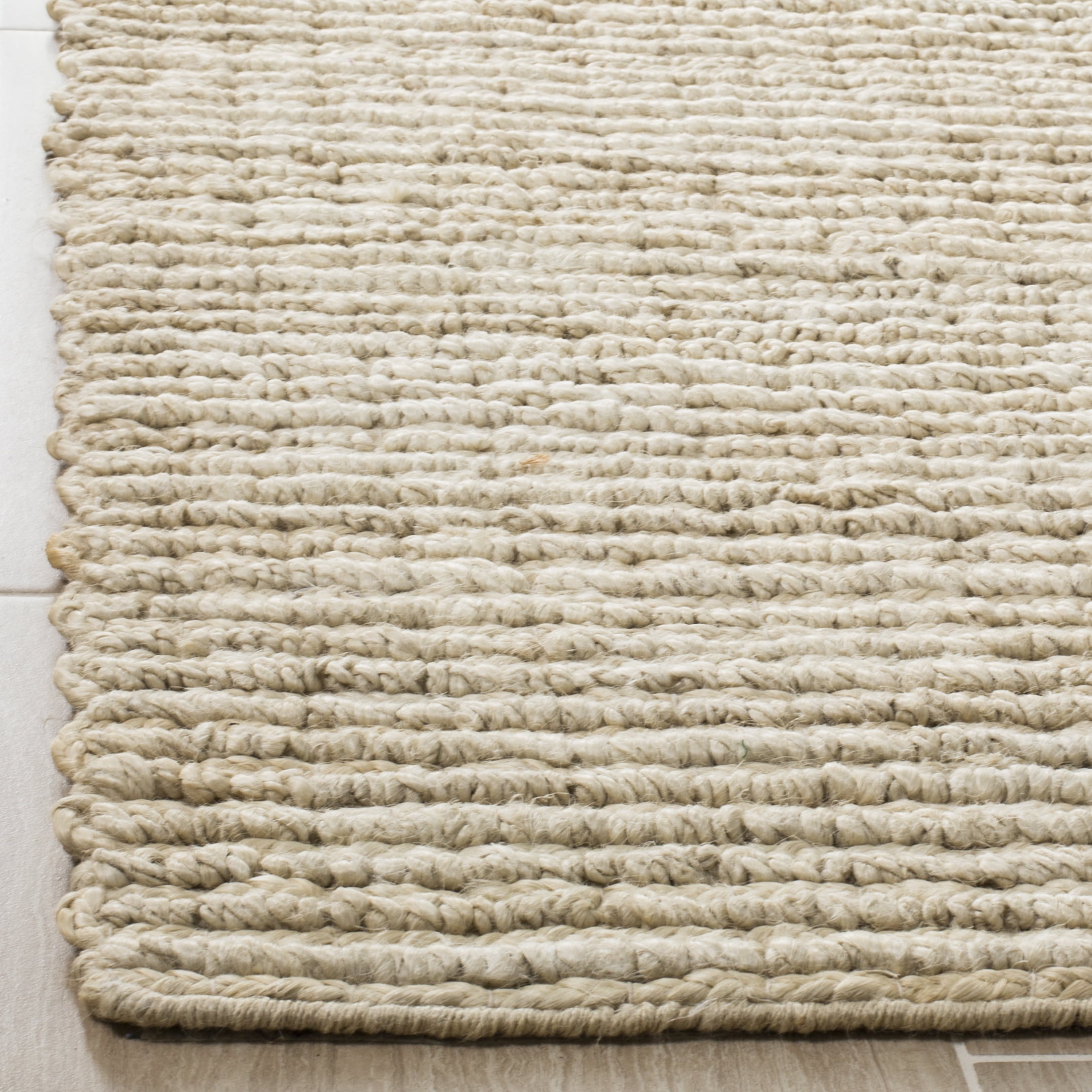 SAFAVIEH Natural Fiber Sheryll Solid Braided Jute Area Rug, Ivory, 9' x 12'