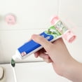 thumbnail image 4 of ZheElen 1 PCS for Creative Rolling Squeezer Toothpaste Dispenser Tube Partner Sucker Hanging Holde Distributeur Dentifrice color random 7.9*7.7cm 1Set, 4 of 6