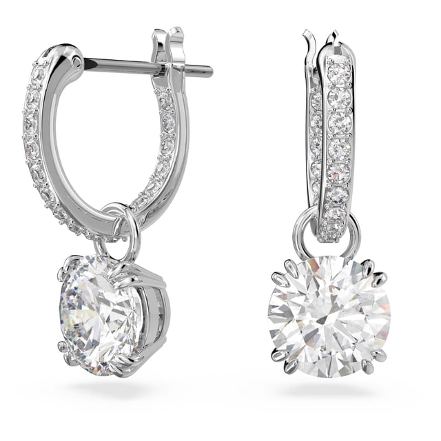 pendientes swarovski constella con forma de aro perforados en forma de gota, acabado en rodio — aretes plateados de 3/4 pulgadas con aro fino engastado en cristales blancos y colgante de gota con cristal redondo facetado; vista frontal en primer plano sobre fondo blanco, adecuados para looks formales o como regalo.