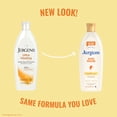 thumbnail image 2 of Jergens Ultra Healing Hand And Body Lotion Dry Skin Moisturizer, Vitamins C, E, B5, 10 fl oz, 2 of 11