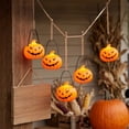 thumbnail image 3 of Battery Operated Mini Handheld LED Pumpkin Lantern, Small Jack-O'-Lantern Night Light, Compact Table Decor for Mantel Shelf, Holiday Party Tiered Tray and Indoor Halloween Decoration, 3 of 7