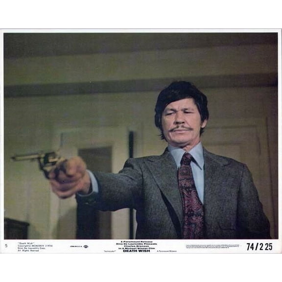 Death Wish 1974 Charles Bronson as Paul Kersey aims gun 8x10 inch photo