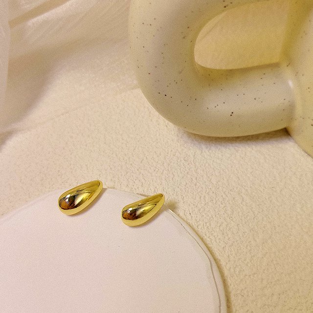 Pendientes de gota de agua dorada, nicho, pendientes de diseño avanzado europeo y americano, pendientes de temperamento únicos