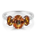 thumbnail image 2 of Gem Stone King 10K White Gold Ecstasy Mystic Topaz Orange Red Madeira Citrine and White Diamond Oval 3-Stone Engagement Ring for Women (2.10 Cttw, Gemstone, Size 8), 2 of 3