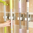 thumbnail image 3 of Soporte organizador doble para fregona montado en la pared, colgador para escoba, estante de almacenamiento, herramienta de cocina, 2 uds., 3 of 6