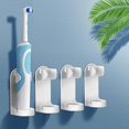 thumbnail image 1 of Soporte para cepillos de dientes eléctricos NQ 4 piezas organizador de pasta de dientes de pared autoadhesivo de plástico multifuncional, 1 of 5