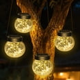 thumbnail image 1 of Luces colgantes solares Kolpop, paquete de 4, impermeables, color blanco cálido, 1 of 6
