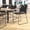 Black, variant on Emma + Oliver Heavy Duty 660 lb. Capacity Navy Ergonomic Polypropylene Stack Chair with Perforated Back and Steel Sled Base