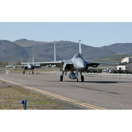 Two F-15 Eagles from the 173rd Fighter Wing taxi out to take off on a training mission from Klamath Falls Oregon Poster