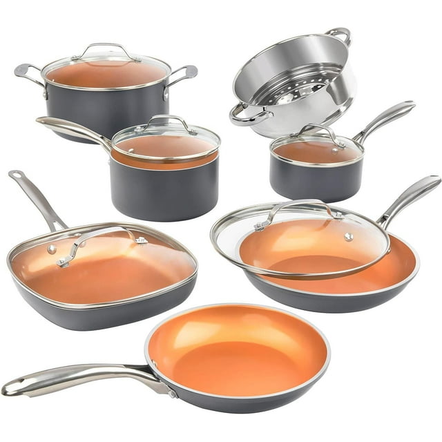 Gotham Steel 12 piece cookware set featuring ultra nonstick copper ceramic interiors with black exteriors, includes various pots and pans with glass lids plus a stainless steel steamer insert.