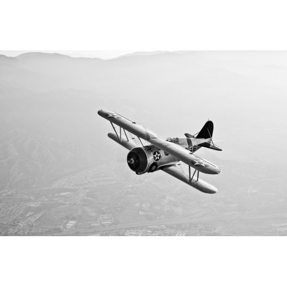 A Grumman F3F biplane in flight Canvas Art - Scott GermainStocktrek Images (35 x 23)