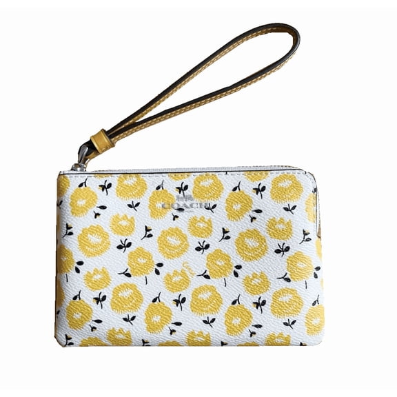 Coach Corner Zip Wristlet In Signature Canvas