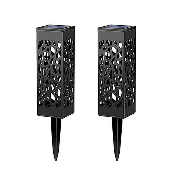 Lámparas solares de jardín con diseño hueco, iluminación cálida, impermeables y energizadas por panel solar. Ideal para exteriores, encienden automáticamente al anochecer. Disponible en sets de 2, 4,