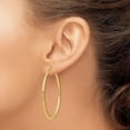 thumbnail image 3 of 14k Yellow Gold Polished 2x50mm Tube Hoop Earrings, 3 of 6