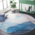 thumbnail image 2 of SAFAVIEH Tacoma Leon Abstract Machine Washable Area Rug, Blue/Gold, 5' x 8' Oval, 2 of 12