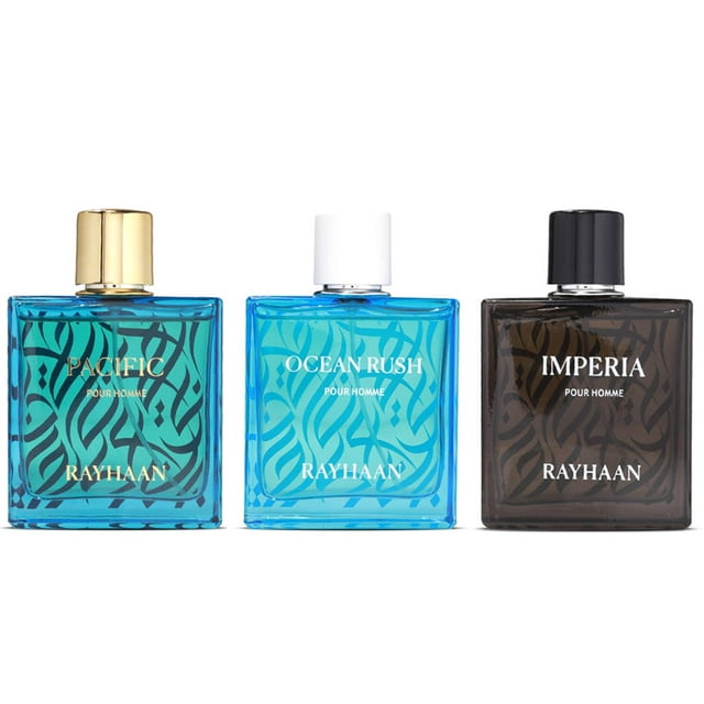 set de fragancias rayhaan original collection para hombre 100 ml x 3 muestra tres frascos frontales alineados. Pacific: frasco azul verdoso con tapa dorada y etiqueta PACIFIC; Ocean Rush: frasco azul claro con tapa blanca y etiqueta OCEAN RUSH; Imperia: frasco ahumado marrón con tapa negra y etiqueta IMPERIA. Cada botella cuadrada muestra el logo RAYHAAN y un patrón orgánico en el vidrio sobre fondo blanco. Suele usarse como set de regalo.