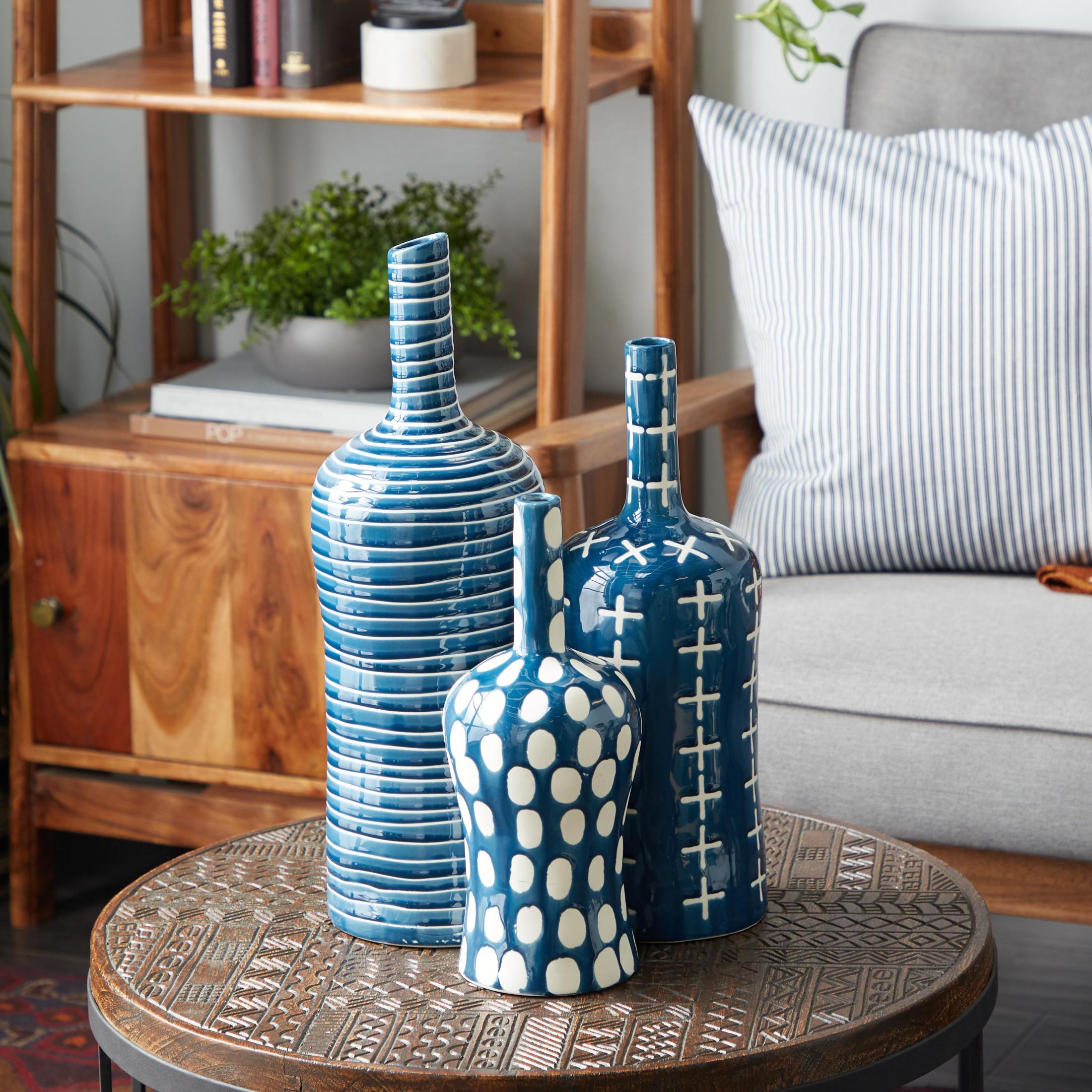 DecMode 12", 15", 19"H Blue Ceramic Vase with Varying Patterns, Set of 3