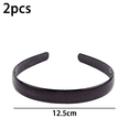 thumbnail image 2 of Juego de 2 diademas con peine para el pelo de plástico negro con forma de diente de tiburón, 2 of 5