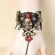 thumbnail image 2 of KAKOWELY Pulsera de encaje negro con cadena de mano de calavera pirata para mujer, accesorios para fiesta de Halloween, 2 of 5