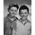 thumbnail image 2 of Portrait of a boy with a black eye smiling with another boy standing beside him Poster Print, 2 of 4