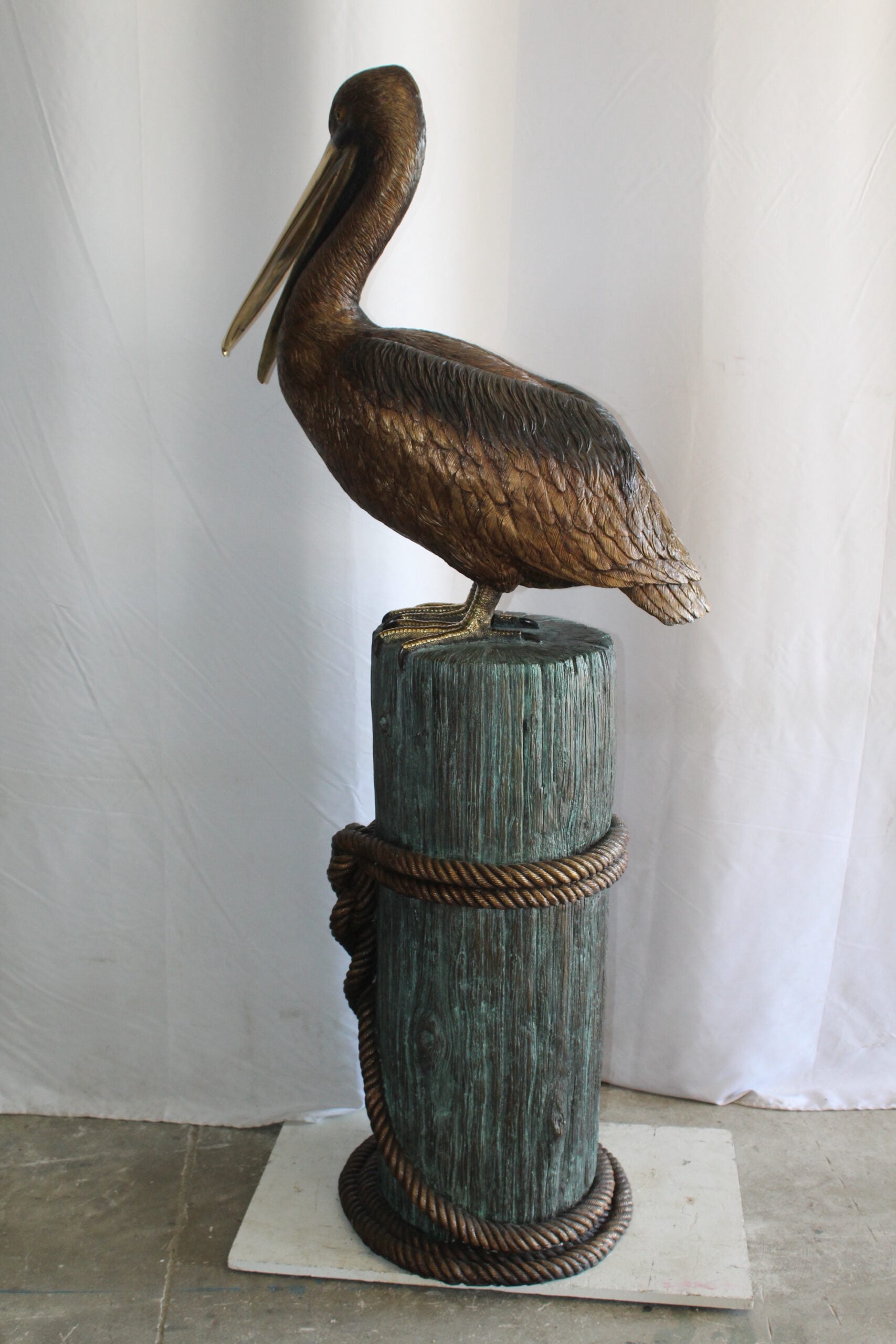 Nifao Pelican Outdoor Fountain Statue Mounted on Tree Stump, Lifesize Bronze Garden Water Feature for Patio & Yard – Garden Outdoor Decor Sculpture, 33"L x 23"W x 73"H