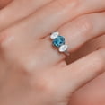 thumbnail image 4 of Gem Stone King 10K White Gold London Blue Topaz White Moissanite and White Lab Grown Diamond 3 Stone Engagement Ring for Women (2.54 Cttw, Gemstone Birthstone, Available in Size 5, 6, 7, 8, 9), 4 of 5