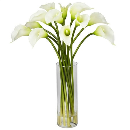 Nearly Natural Mini Calla Lily Artificial Flower Arrangement  Cream Nearly Natural Mini Calla Lily Silk Flower Arrangement The Calla Lily is a centuries old favorite that hails from African origin. The simple yet elegant  bulbs are bright and colorful  with large leaves and a thick stem. The Calla Lily is truly a classic beauty  with an understated radiance. Whether it s for a dining room or a study  Calla Lilies will enhance the decor without dominating it. Comes complete with a beautiful vase with faux water. Height: 20   Width: 15   Depth: 15 . Category: Silk Arrangement. Vase Size: W: 3.25 in  H: 10.5 in Available Color Variations: Cream  Pink  Yellow Brand: Nearly Natural Model Number: 1368-1187Shipping Details