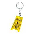 thumbnail image 1 of Llavero acrílico amarillo Funny Caution Slippery When Wet, 1 of 2