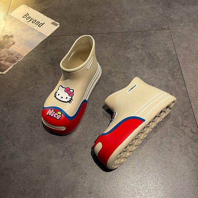 Sanrio-zapatos impermeables de Hello Kitty para mujer, Botas de lluvia con suela gruesa y punta redonda, antideslizantes, para exteriores