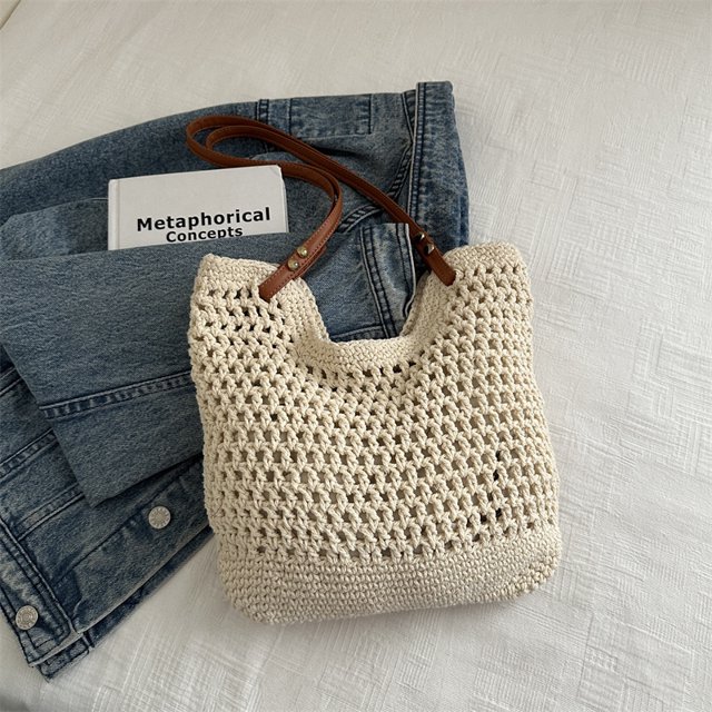 Bolso tejido de algodón para otoño e invierno 2025, nuevo bolso de hombro de gran capacidad para mujer, diseño de nicho, bolso de mano hueco