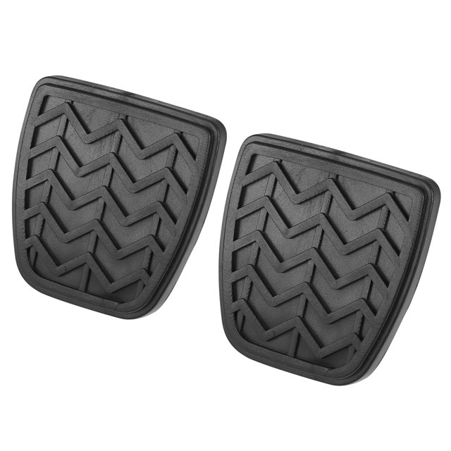 1 par de cubiertas de pedal de acelerador de gas 31321-52010 almohadillas de pedal de freno para Toyota Yaris R 2016 para Toyota RAV4 2001-2005, fundas negras de goma con tacos antideslizantes en zigzag, vista frontal centrada que muestra silueta rectangular con esquinas redondeadas. Diseñadas para transmisión automática, se instalan presionando sin taladro; también suelen usarse para reemplazar cubiertas de pedal gastadas.