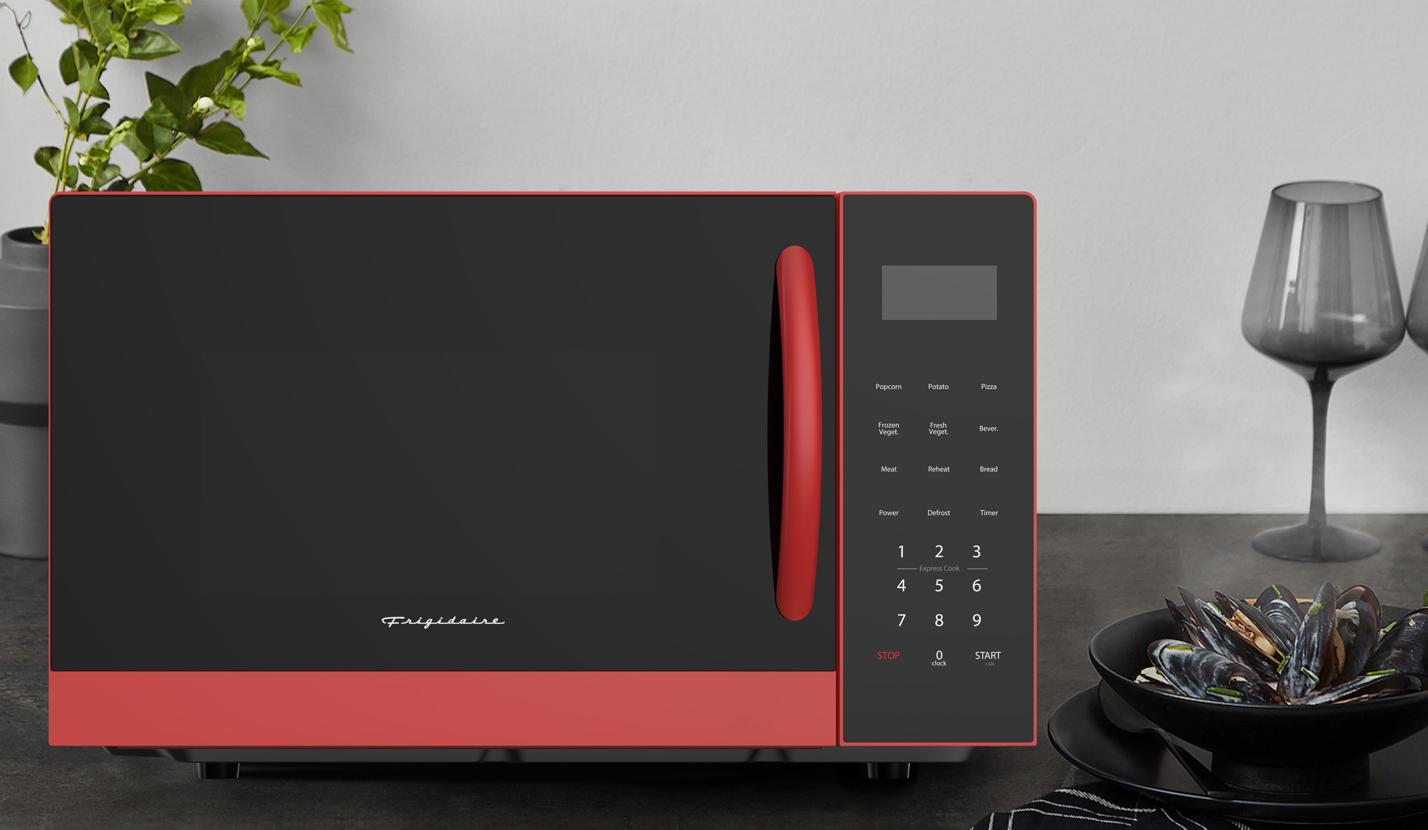 Frigidaire 0.9 Cu. ft. Countertop Microwave, 900 Watt Microwave with 10 Power Levels, Red EMW953