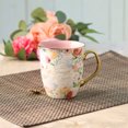 thumbnail image 2 of Christian Art Gifts Large Ceramic Floral Scripture Coffee & Tea Mug for Women: Strength & Dignity - Prov. 31:25 Inspirational Bible Verse w/Multicolored Flowers & Gold Accents, White & Pink, 14 oz., 2 of 4