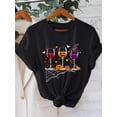 thumbnail image 1 of Women's Halloween Wine Graphic Print T-Shirt - Black Casual Short Sleeve Crew Neck Top with Pumpkin, Bat & Spiderweb Design, Machine Washable Regular Fit for all-Season Wear, Festive apparel, 1 of 6