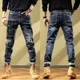 thumbnail image 3 of Pantalones vaqueros rotos con agujeros para hombre, pantalones cargo con gráficos, pantalones vaqueros para hombre, ropa de otoño rota, estilo retro, algodón apilado, informal, 3 of 5
