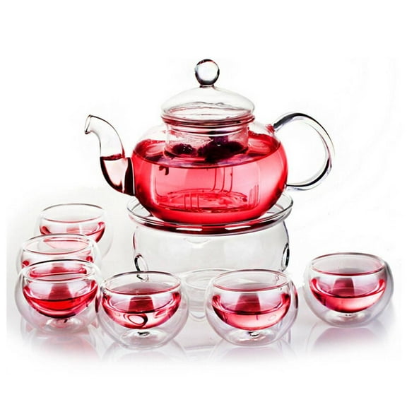 Glass Teapot with Infuser Warmer and 6 Double Cups. Delight in the elegance of tea rituals with this captivating glass tea set, modern design with timeless functionality. Ships from  Texas