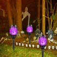 thumbnail image 2 of Luz De Antorcha De Llama Solar Luz parpadeante para decoración de jardín, luz de camino, IP55, resistente al agua (luz morada, 4 unidades), 2 of 6