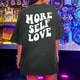 thumbnail image 2 of Camisetas de gran tamaño para mujer, camisetas de manga corta con eslogan gráfico de talla grande y hombros caídos, camisetas holgadas de verano Fridja  gope3618, 2 of 9