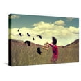 thumbnail image 1 of A Girl Walking through a Field with a Flock of Ravens or Crows Toned with a Retro Vintage Instagram, Figurative Stretched Canvas Wall Art by Annette Shaff Sold by ArtCom, 1 of 1