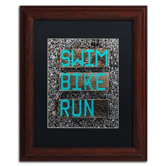 Trademark Fine Art 'The Triathlete' Canvas Art by Nicole Dietz, Black Matte, Wood Frame