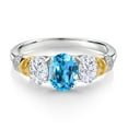 thumbnail image 2 of Gem Stone King 925 Sterling Silver and 10K Yellow Gold Oval Swiss Blue Topaz White Moissanite and White Diamond 3 Stone Ring for Women (2.53 Cttw, Gemstone November Birthstone, Size 5), 2 of 3
