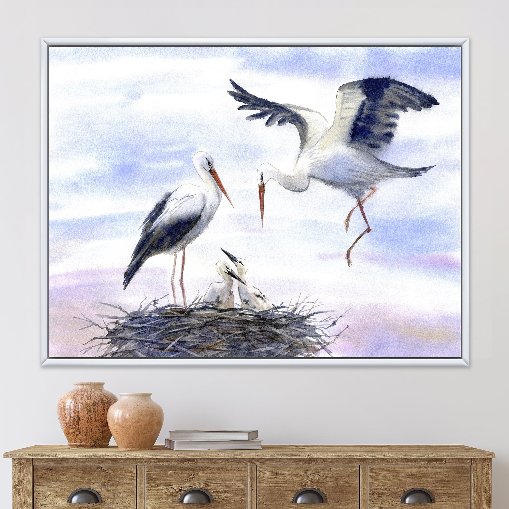 Storks With Babies In The Nest 20 in x 12 in Framed Painting Canvas Art Print, by Designart