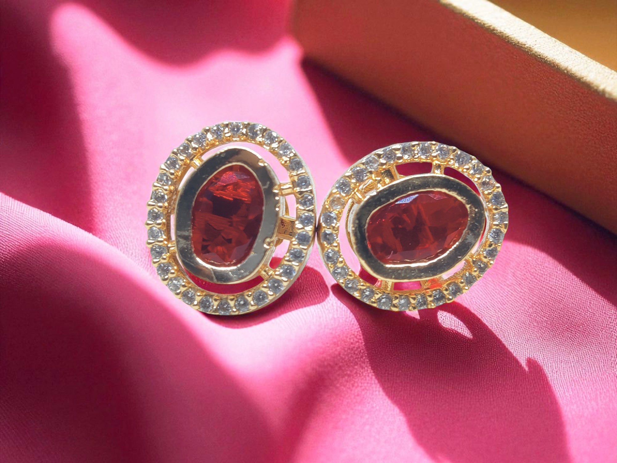 Juhi Jewels Gold Tone Brass Stud Earrings for Women – Red Crystal Gem with Clear Crystal Halo, Anti-Tarnish Fashion Jewelry
