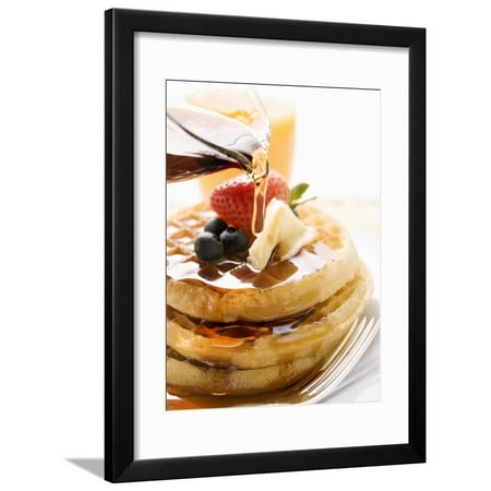 Pouring Maple Syrup over Waffles with Butter and Berries Framed Print Wall