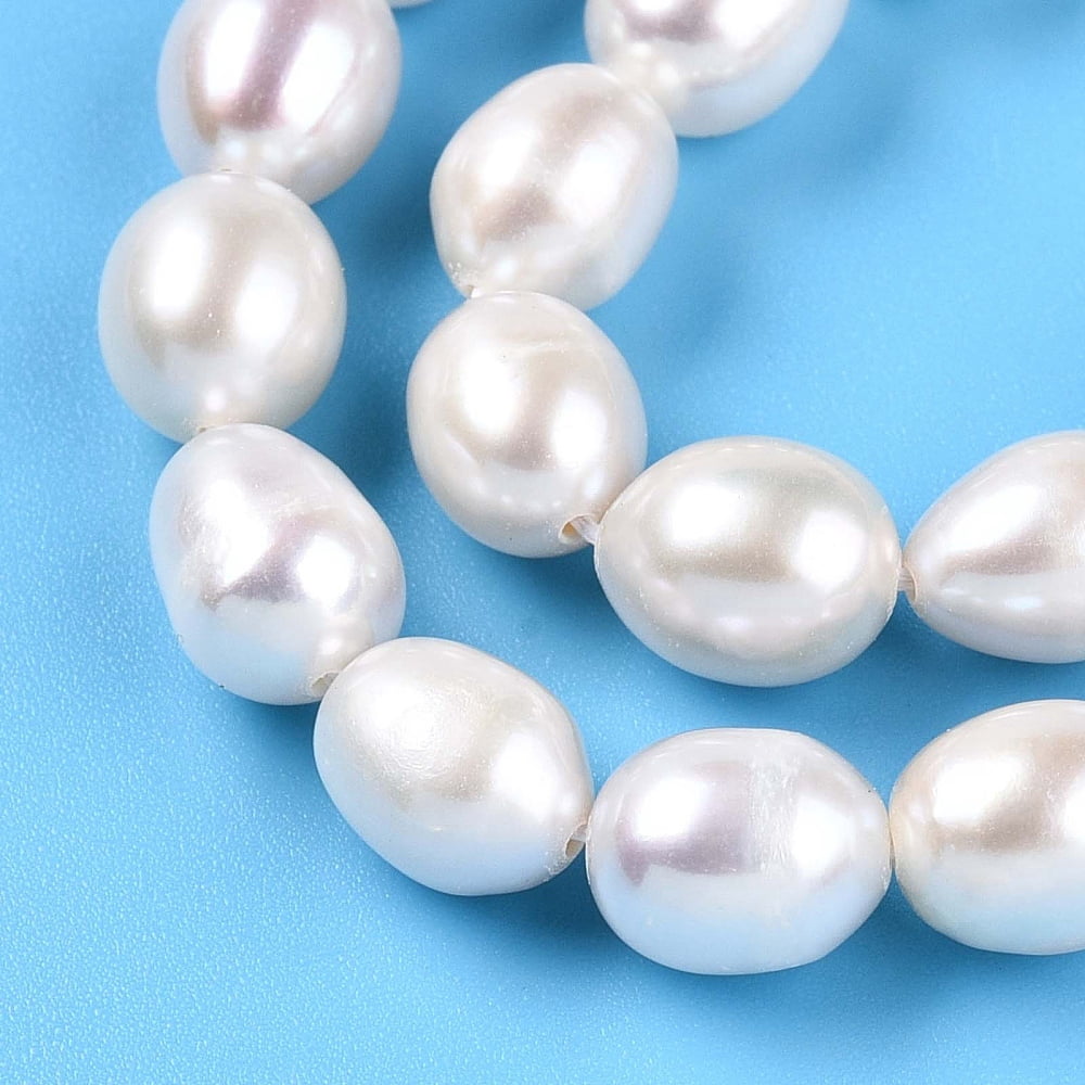 Natural Cultured Freshwater Pearl Beads Strands Rice Creamy White 8~9.5x6~7.5mm Hole: 0.7mm about 41~42pcs/strand 13.98~14.37 inch(35.5~36.5cm)