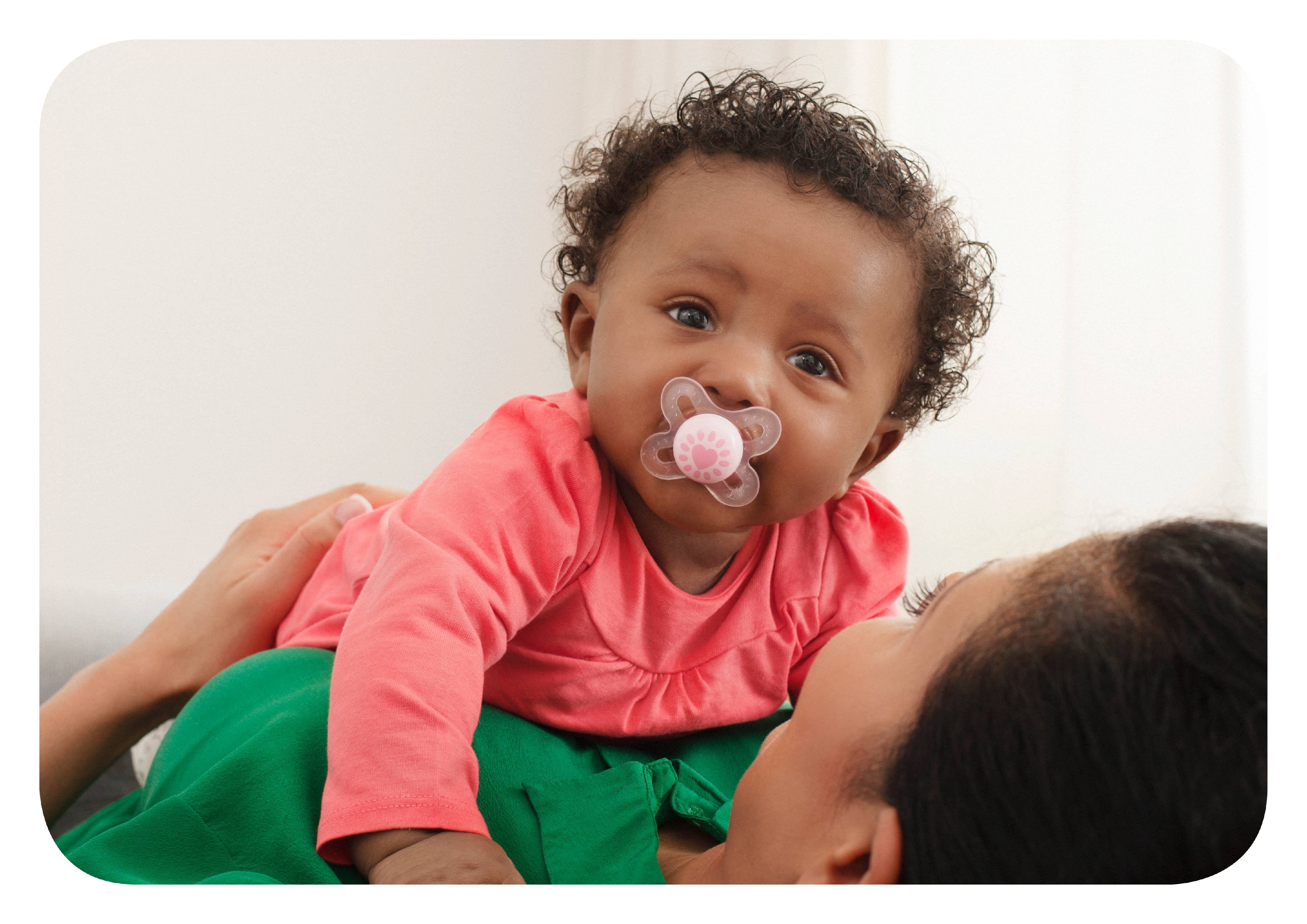 Baby Putting Things In Mouth