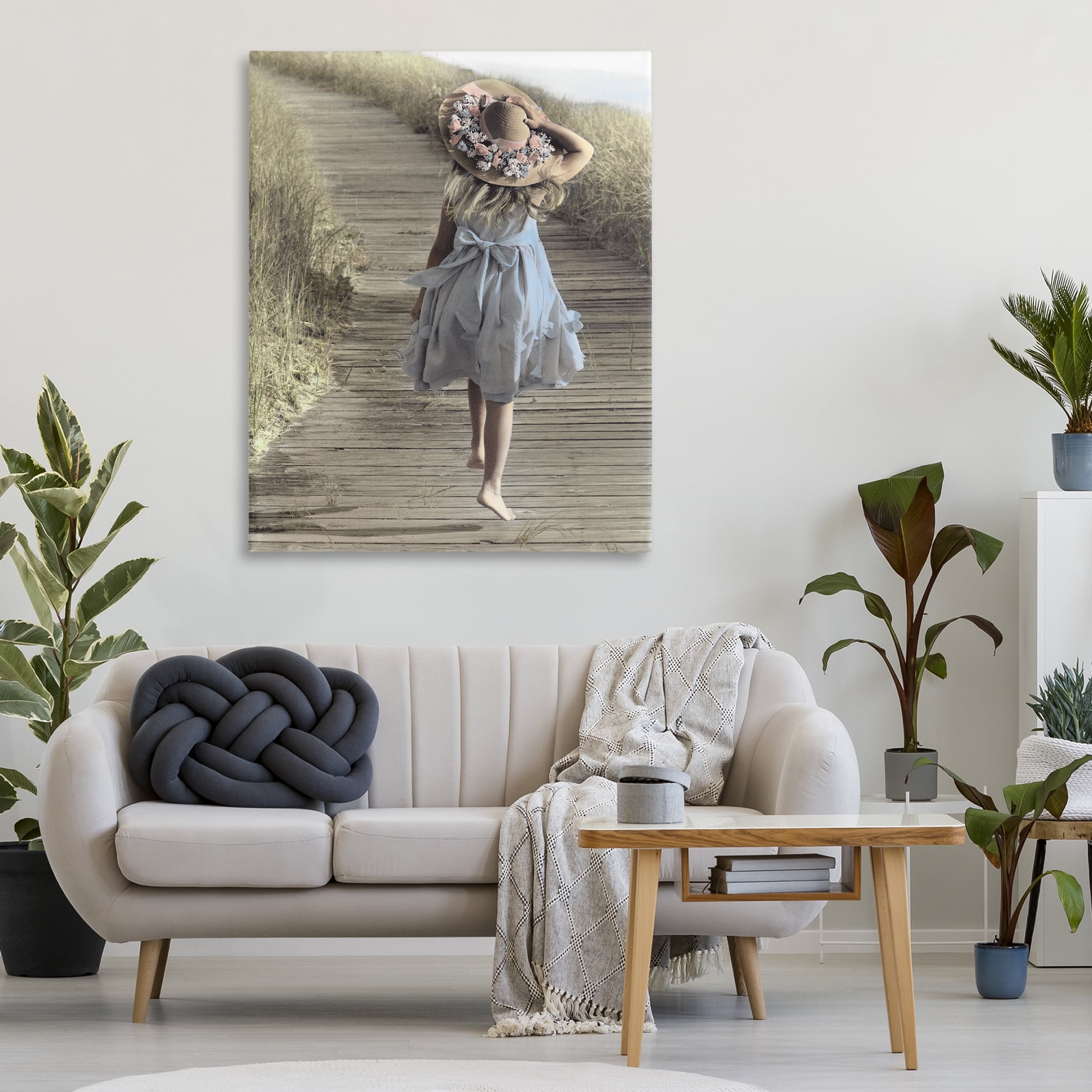 Stupell Industries Girl With Sun Hat Walking Canvas Wall Art, design by Kendra Dew