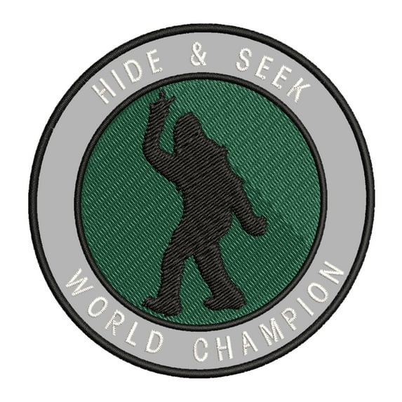 Bigfoot Hide & Seek World Champion 3.5" Iron On Or Sew On Embroidered Fabric Badge Patch Unexplained Mysteries Iconic Series
