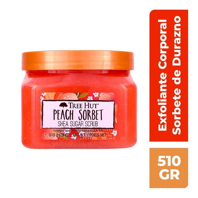 exfoliante corporal tree hut sorbete de durazno 510 g frasco transparente con tapa naranja, exfoliante color durazno con etiqueta frontal 'Tree Hut Peach Sorbet Shea Sugar Scrub' y motivos florales, vista frontal sobre fondo blanco; contiene manteca de karité y aceites vegetales y suele usarse para exfoliación corporal y suavizar codos o rodillas.