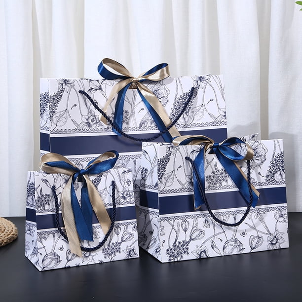 Bolsa de embalaje de regalo con lazo festivo estilo Ins Mori, bolsa de papel portátil, bolsa de compras de ropa impresa, regalo de acompañamiento